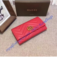 Gucci GG Marmont continental wallet in Red leather with a chevron design Gucci GG Marmont continental wallet in Red leather with a chevron design